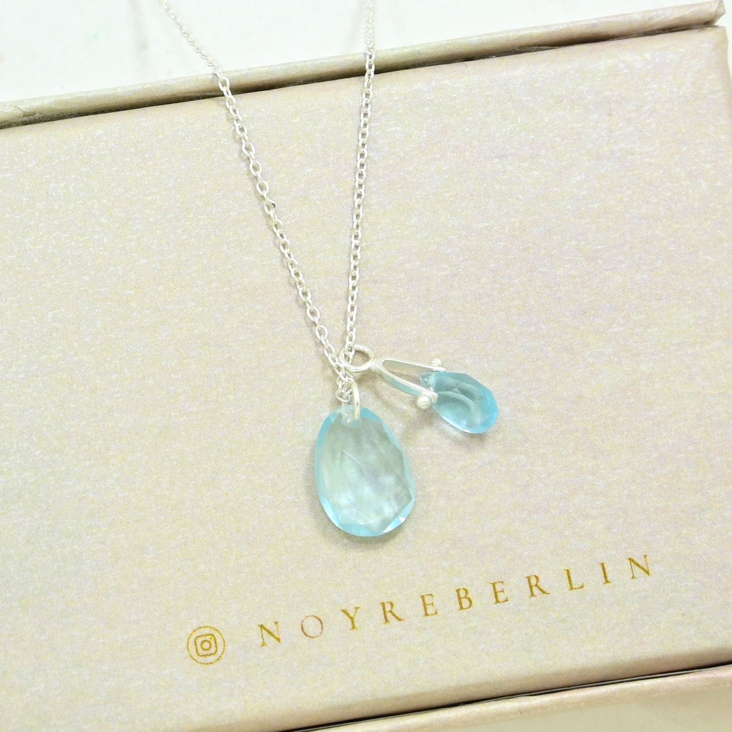 Silver necklace with Blue Topaz gemstone pendant