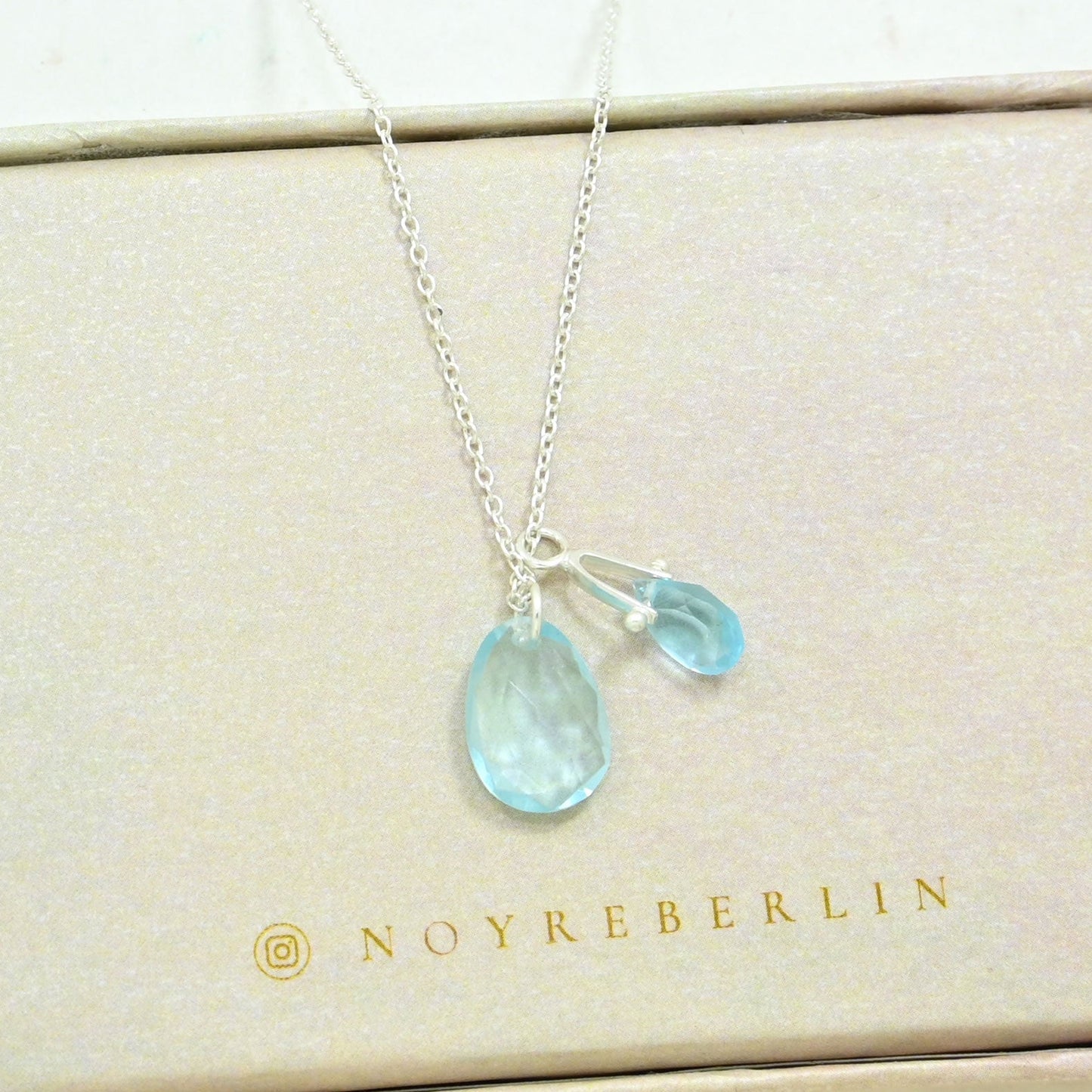 Silver necklace with Blue Topaz gemstone pendant